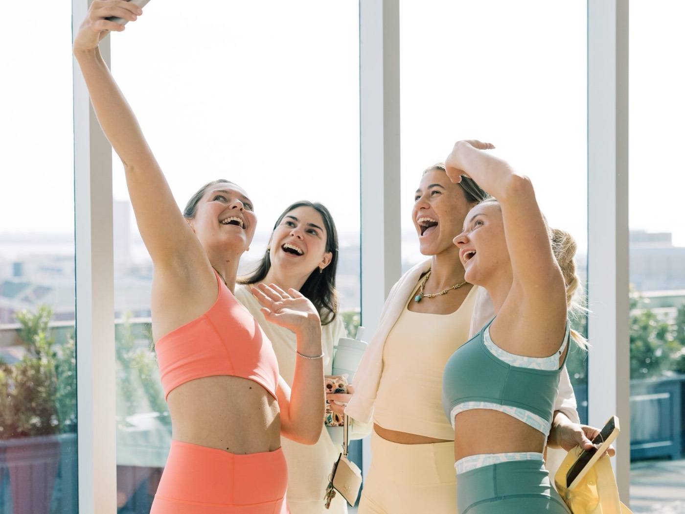 Local creators taking a group selfie together